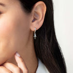 Rizen Calvary Cross Huggie Hoop Earrings | Sterling Silver - Juli's Wearable Art