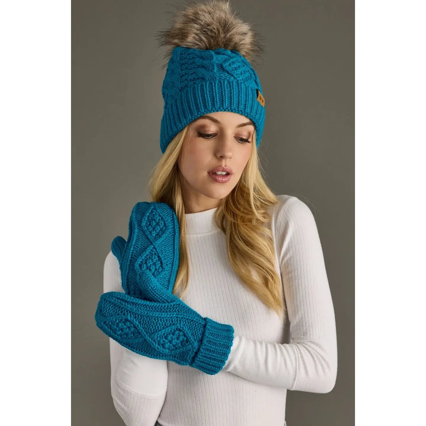 Sapphire Blue Cable Knit Hat with Faux Fur Pom - Juli's Wearable Art